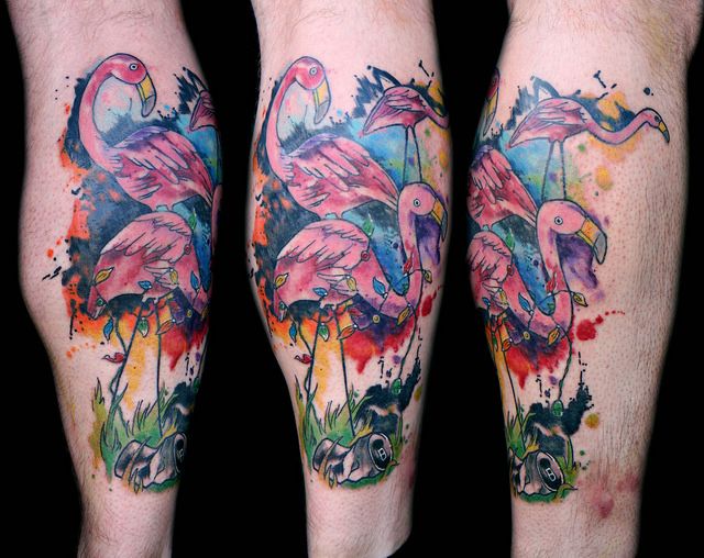 Amazing Watercolor Flamingos With Grass Traditional Tattoo On Forearm