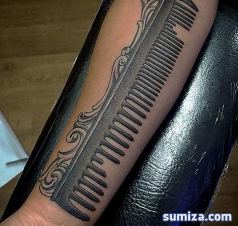 Amazingly Designed Comb Tattoo On Forearm