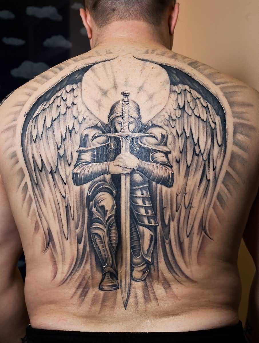 Archangel With Dagger Tattoo On Man Full Back