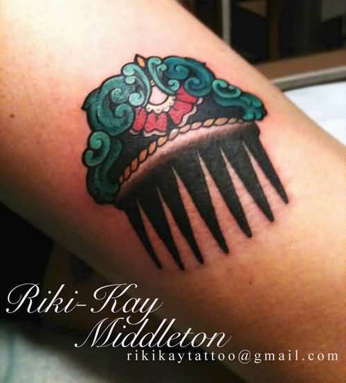 Awesome Colored Royal Comb Tattoo On Forearm