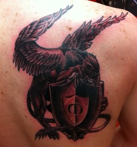 Awesome Griffin With Shield Tattoo On Right Back Shoulder