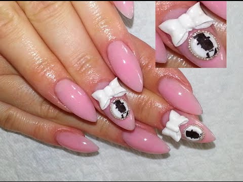 Baby Pink Almond Shaped Acrylic Nail Art With White 3d Bow