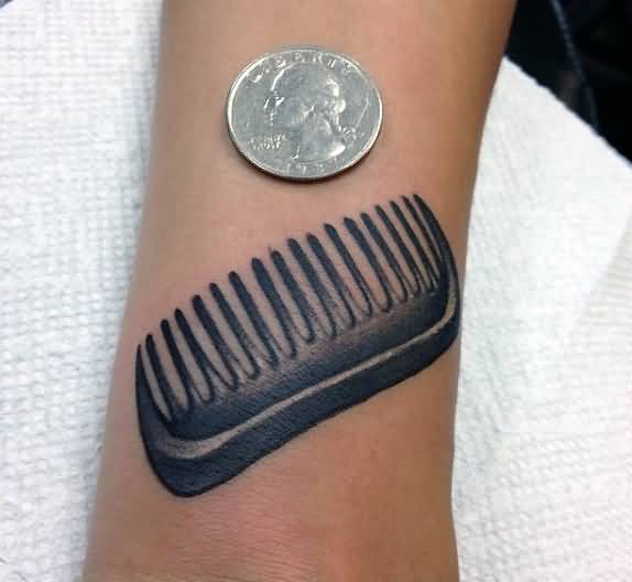 Barber Hair Comb Tattoo On Forearm
