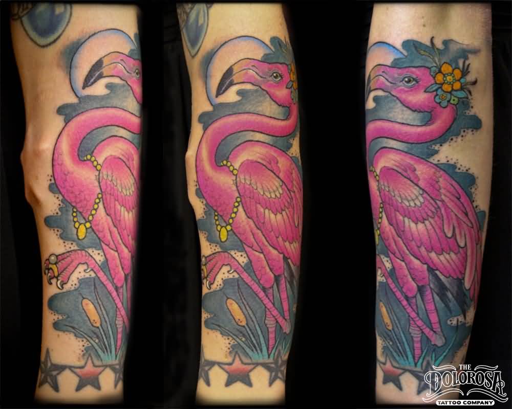 Beautiful Flamingo Wearing Flower With Stars Tattoo On Forearm