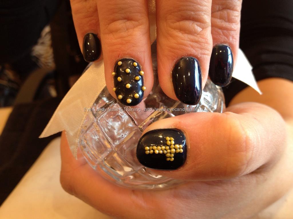 Black Acrylic Nail Art With Gold Caviar Design