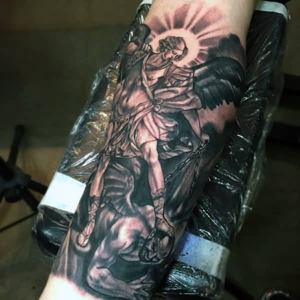 Black And Grey Michael Archangel Tattoo On Forearm