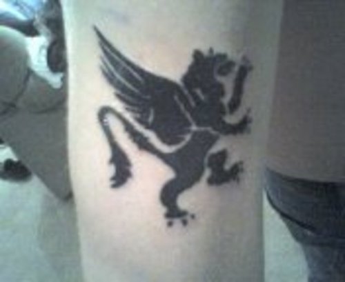 Black Color Griffin Tattoo