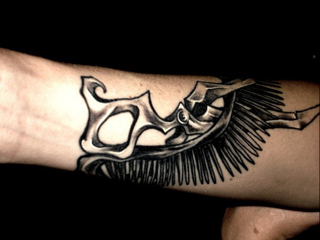 Black Ink Comb And Scissor Tattoo On Right Forearm