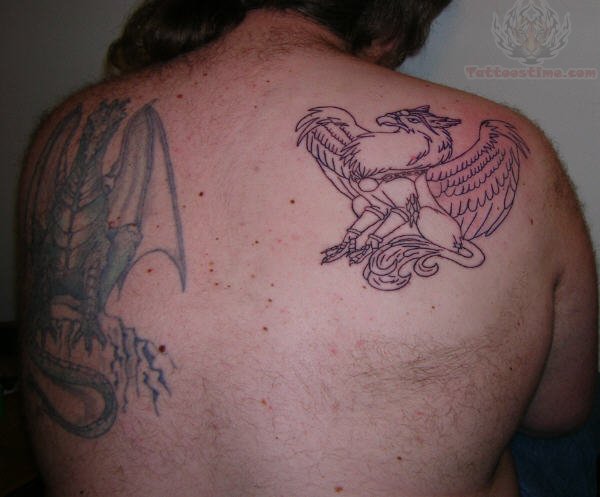 Black Inked Cool Griffin Tattoo On Back Shoulder