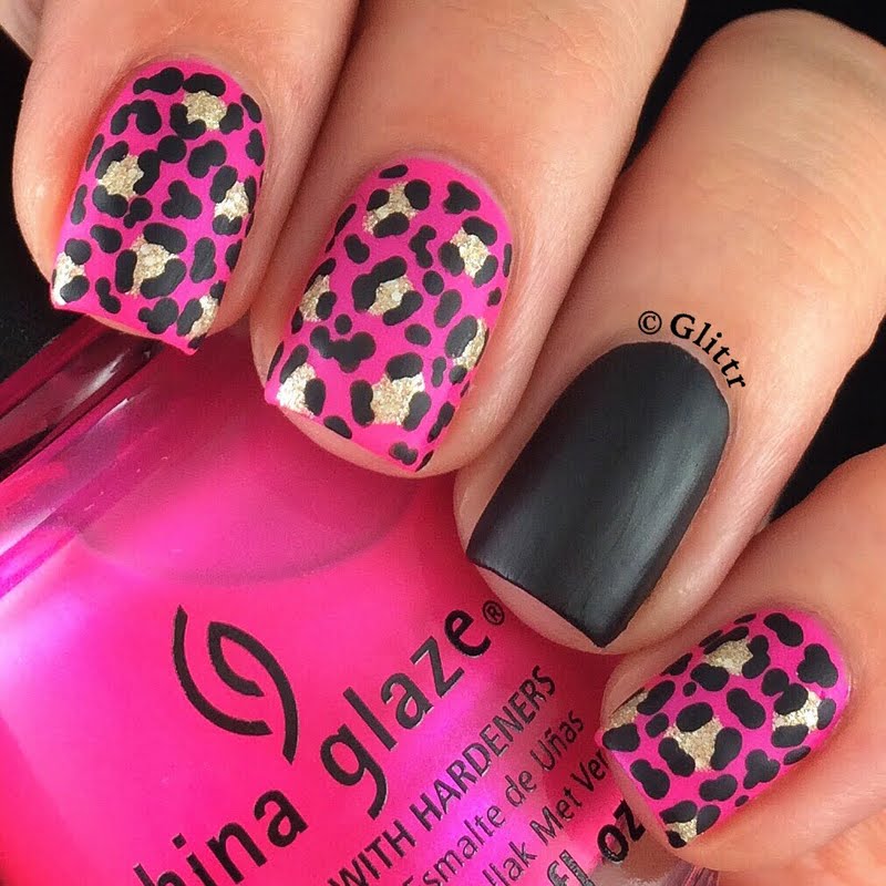 Black Matte Accent Nails With Pink And Silver Leopard Print Nail Art