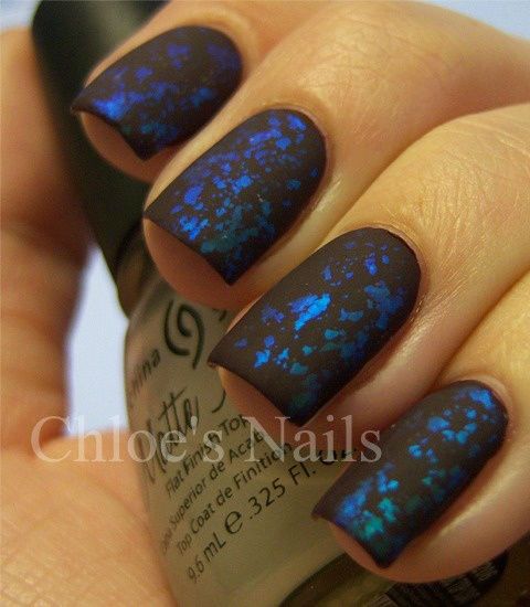Black Matte Nail Art With Blue Sparkle Design