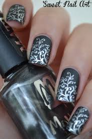 Black Matte Nails With Silver Metallic Flowers Design