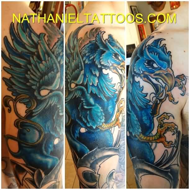 Blue Color Griffin Tattoo On Half Sleeve