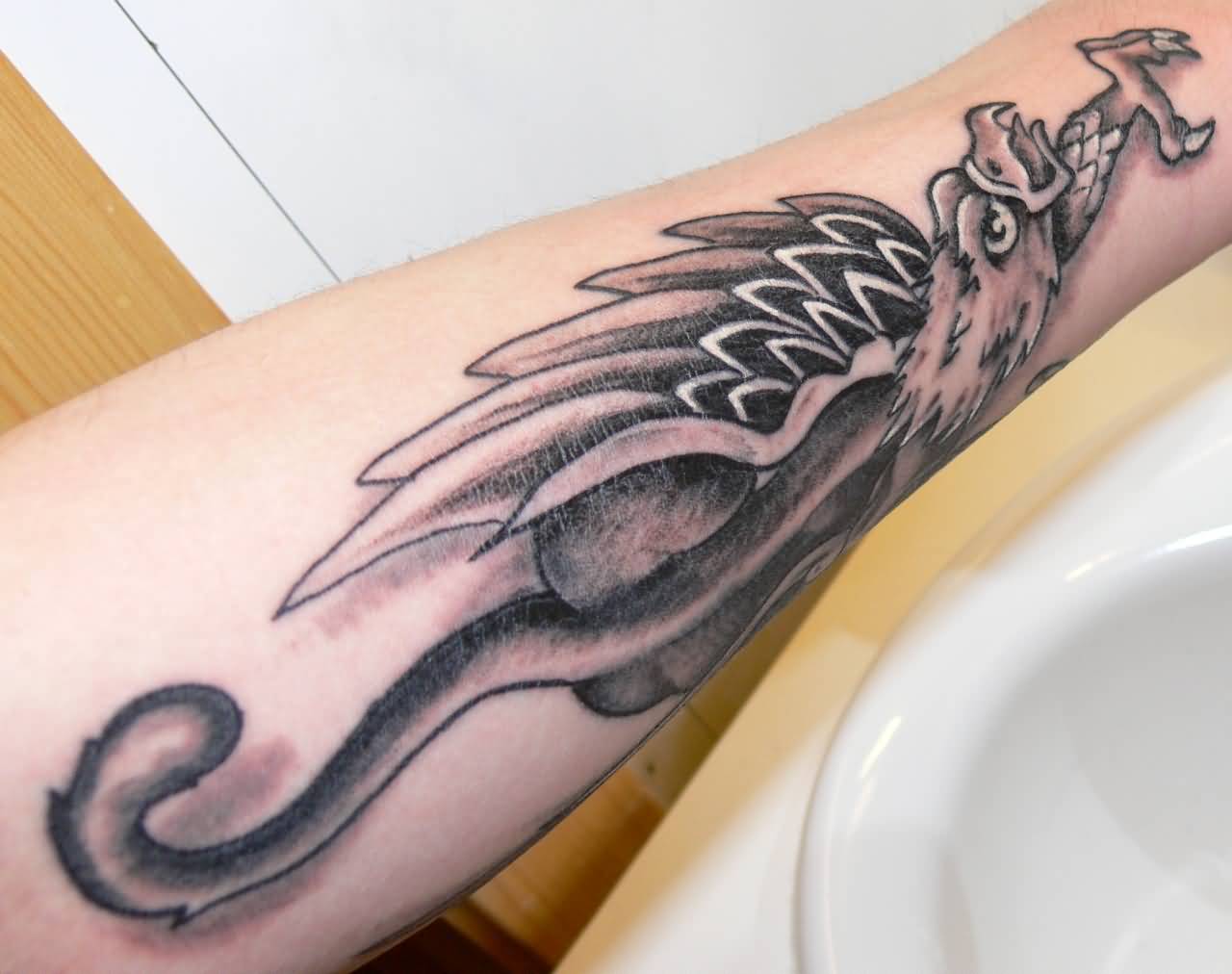 Brilliant Flying Griffin Tattoo On Forearm