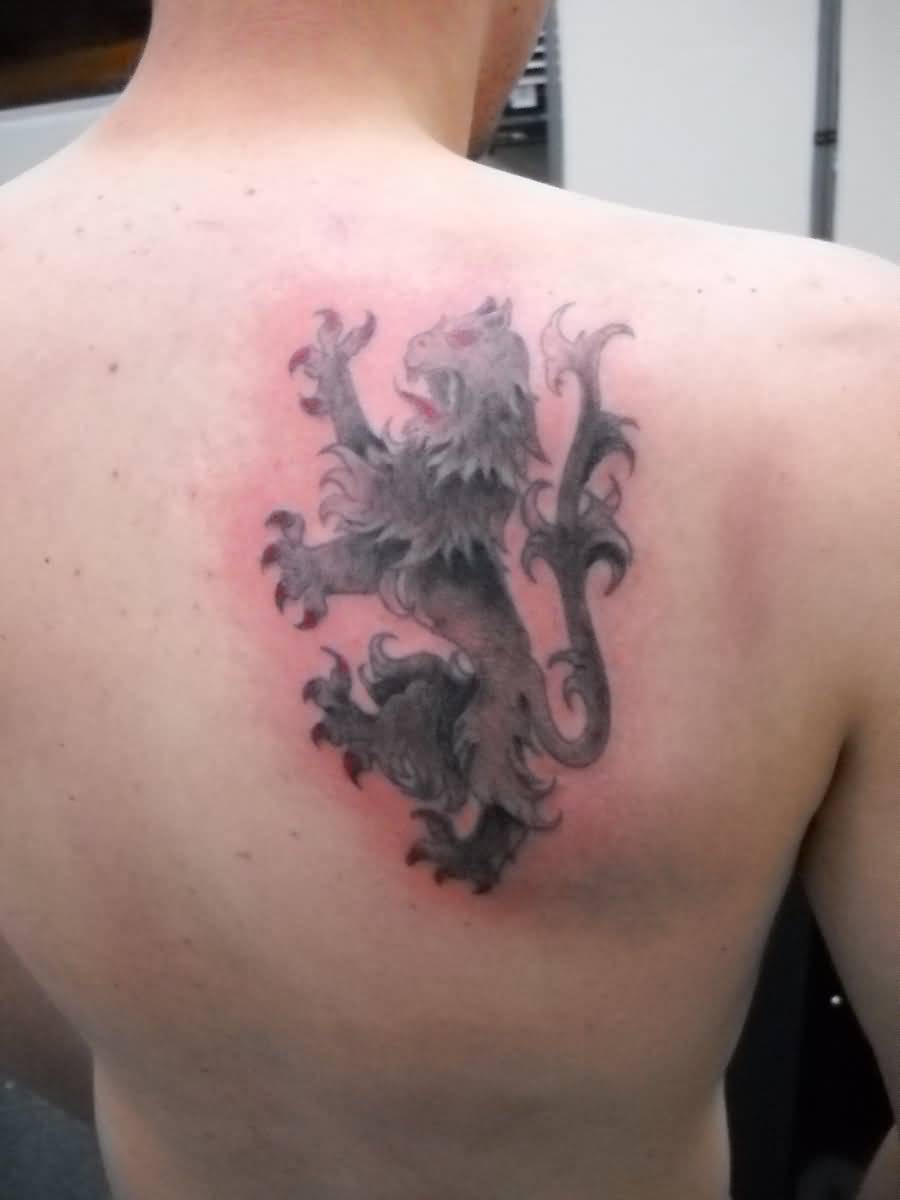 Brilliant Griffin Symbol Tattoo On Upper Back By Lucky Cat