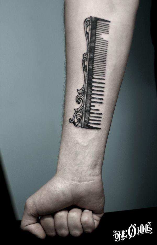 Broken Grey Color Comb With Design Tattoo On Forearm