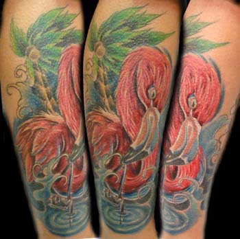 Cartoon Flamingo With Tree And Water Tattoo On Forearm