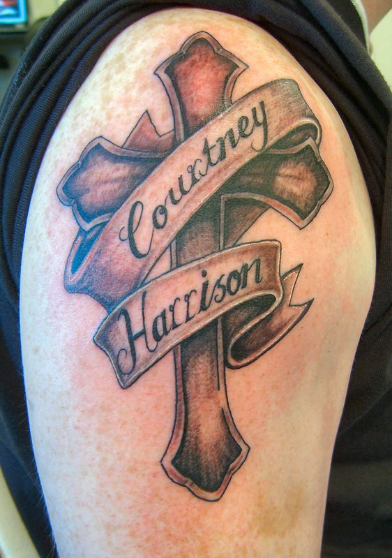 Courtney Harrison Banner And Cross Christianity Tattoo On Shoulder