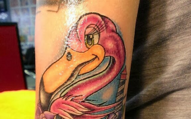 Cute Cartoon Flamingo Tattoo On Forearm