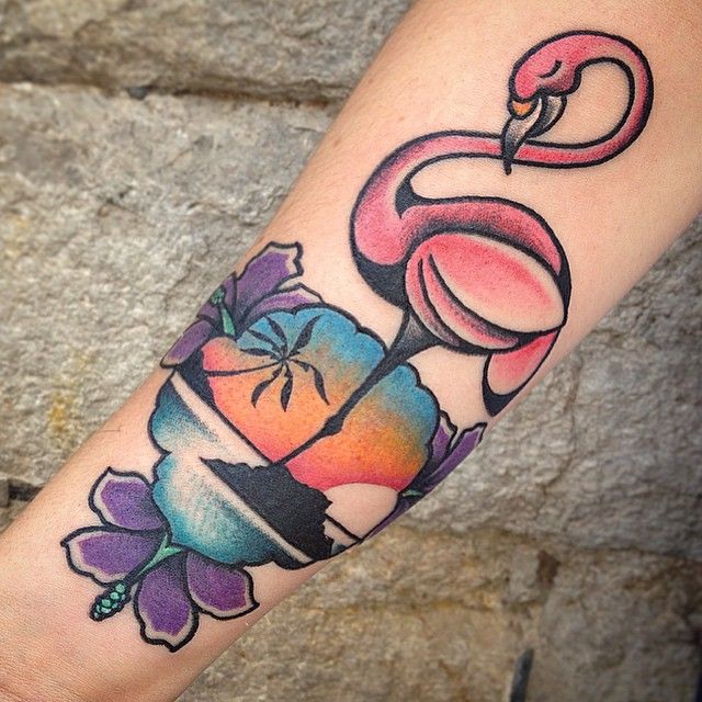 Extremely Beautiful Traditional Flamingo With Purple Flowers Tattoo On Forearm