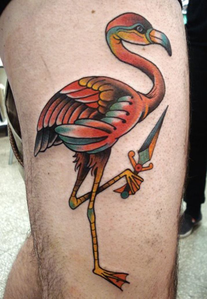 Flamingo Holding Small Sword Tattoo On Thigh