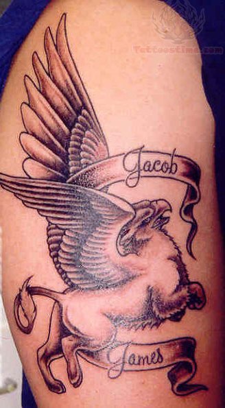 Flying Griffin With Banner Tattoo On Shoulder By Jacob James