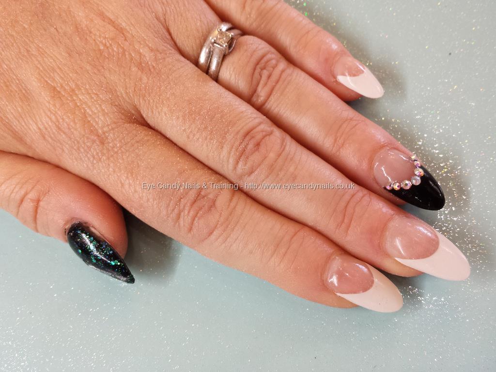 French Tip Almond Acrylic Nail Art With Rhinestones Design.
