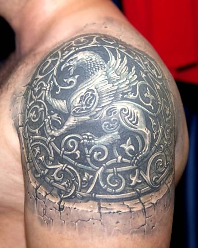 Great Griffin In Old Style Circle Tattoo On Left Shoulder