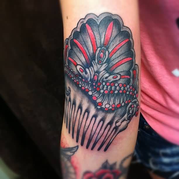 Greatly Designed Grey Ink Extreme Comb Tattoo On Bicep