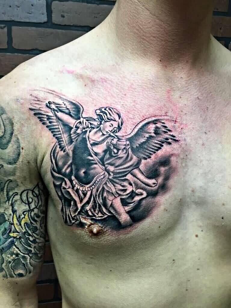 Grey Ink Archangel Tattoo On Man Right Chest