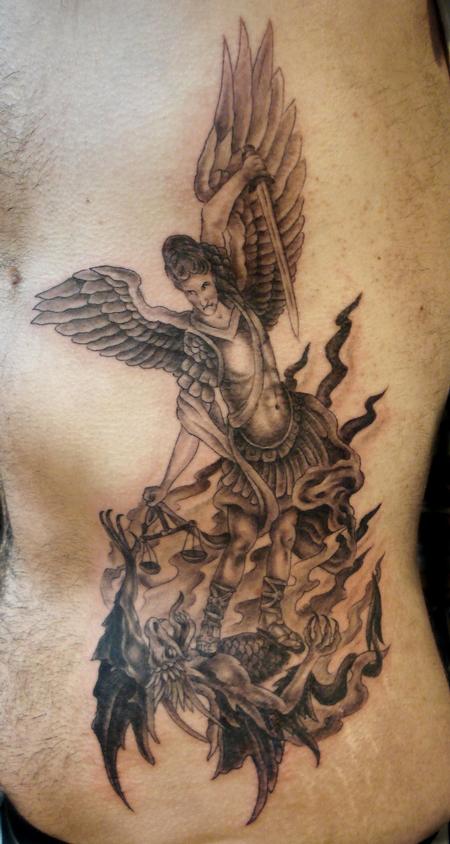 Grey Ink Archangel Tattoo On Man Side Rib