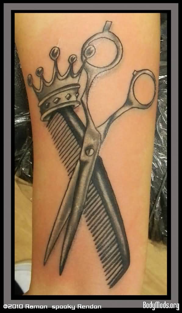 Grey Ink Crown Comb And Scissor Tattoo On Forearm