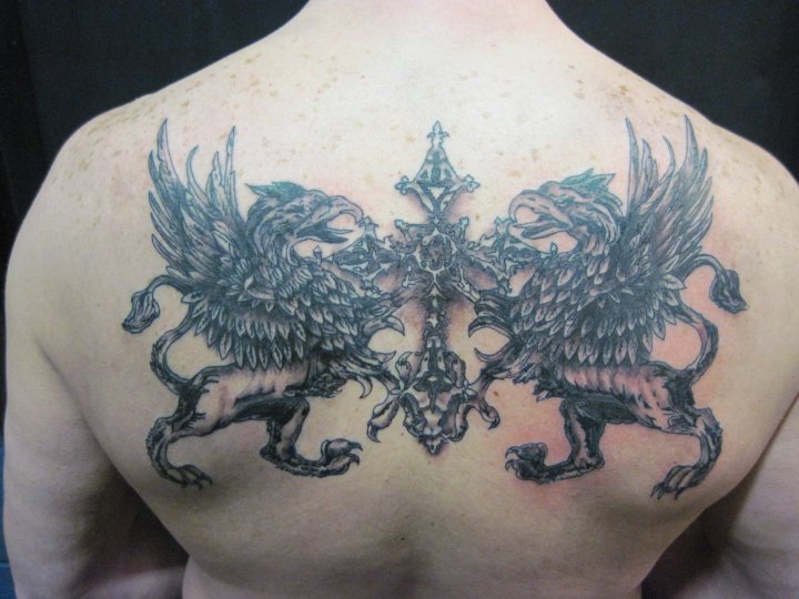 Grey Ink Two Griffins Tattoo On Upper Back
