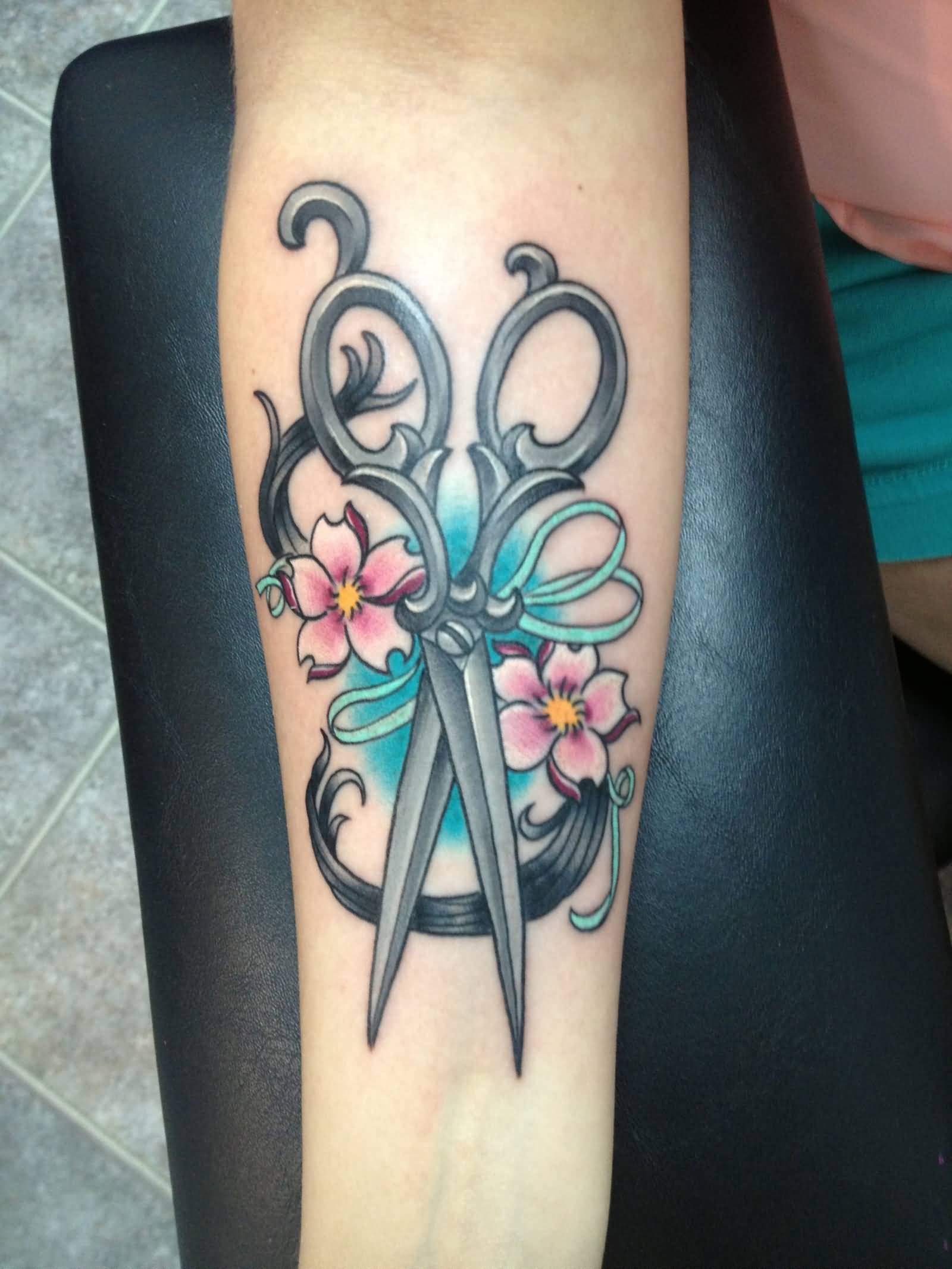 Hair Comb With Flowers And Hair Tattoo On Forearm