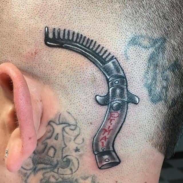 Little Switchblade Comb Tattoo On Head