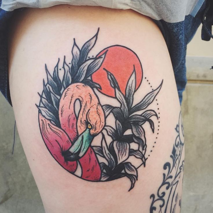Lovely Flamingo With Sun And Leaves In Circle Tattoo On Thigh