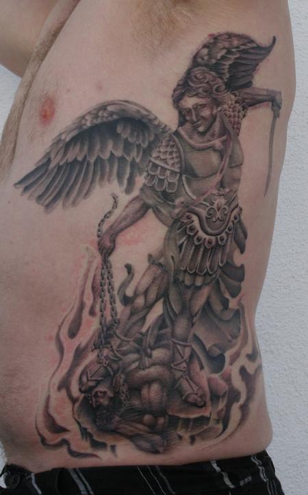 Man Left Side Rib Archangel Tattoo