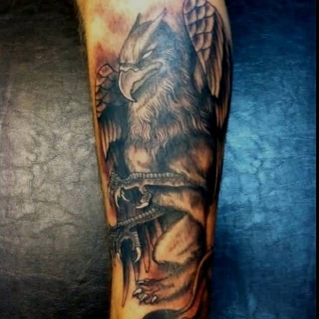 Nice Angry Griffin Tattoo On Forearm