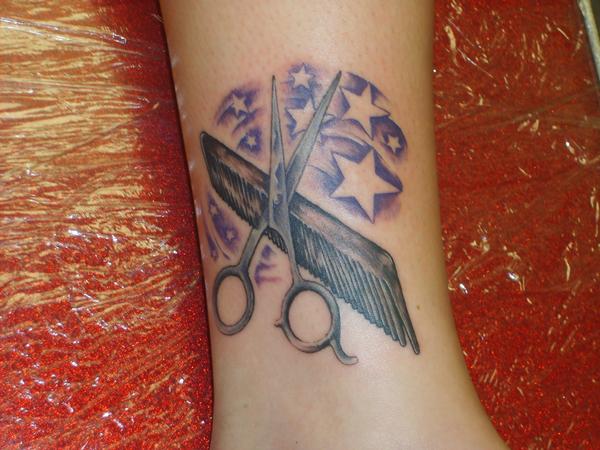 Nice Comb With Scissor And Stars Tattoo