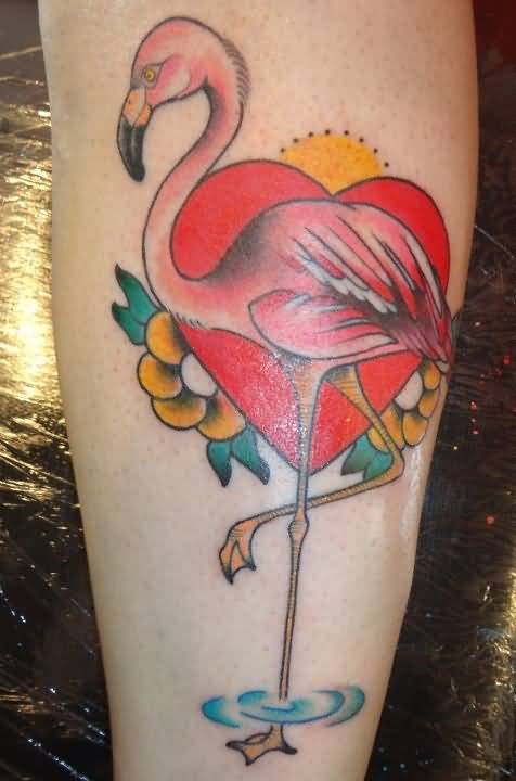 Nice Flamingo With Heart Shape And Flowers Tattoo On Forearm