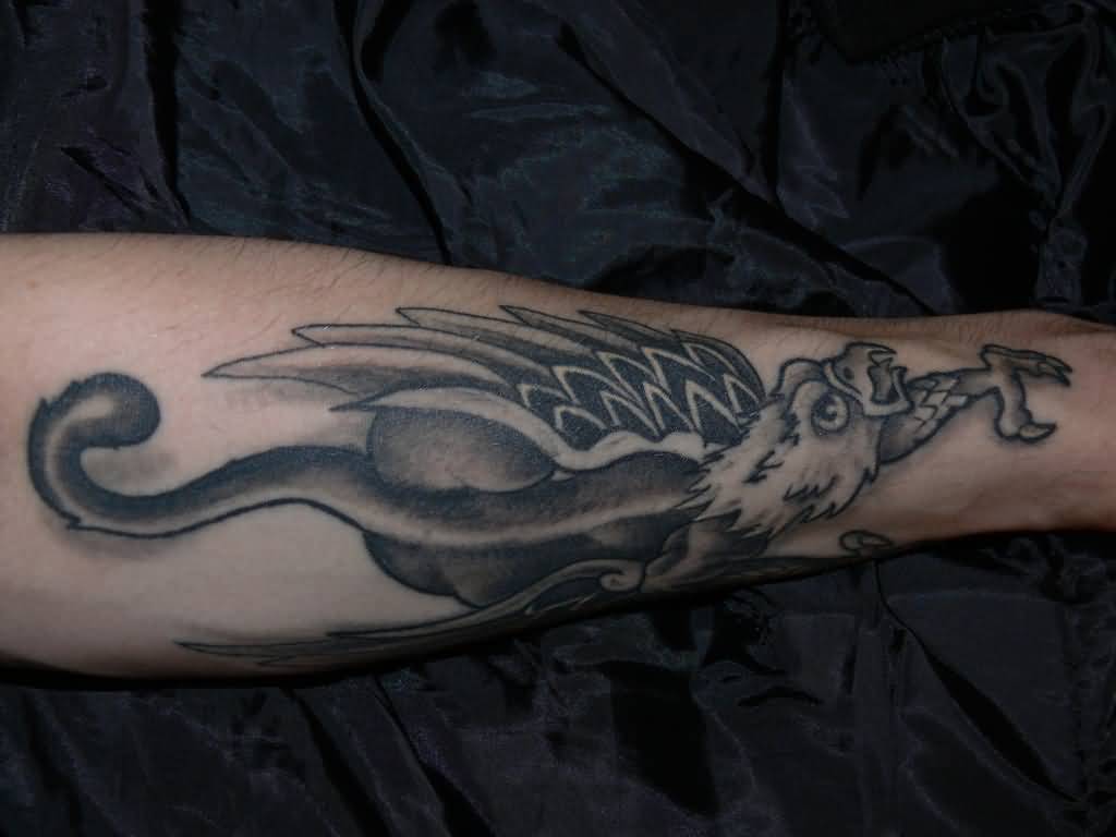 Nice Griffin Tattoo On Forearm