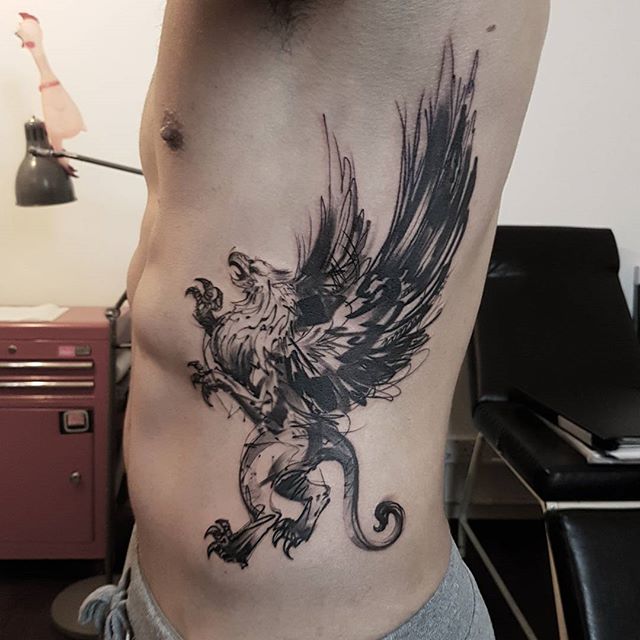 Nice Griffin Tattoo On Side Rib