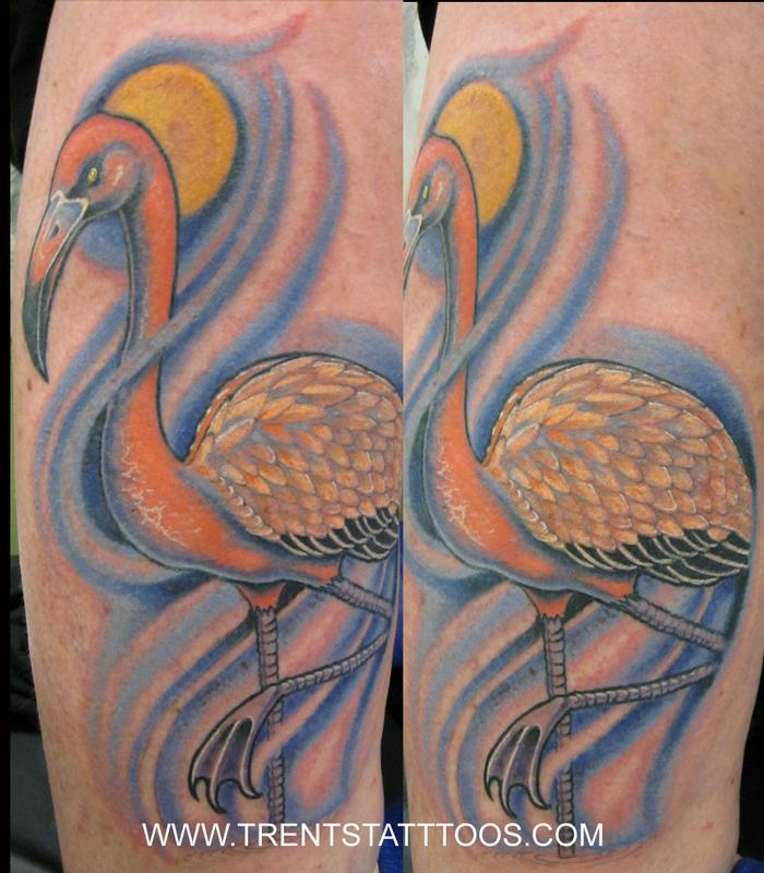 Nicely Colored Flamingo With Yellow Sun Tattoo