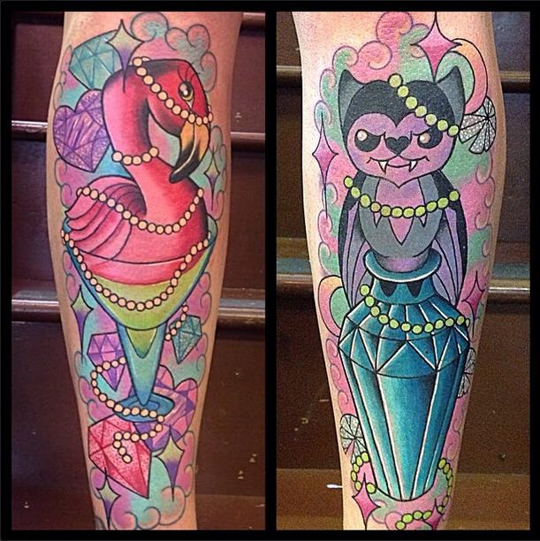 Nicely Designed Colorful Flamingo With Evil Bat Tattoos On Forearms