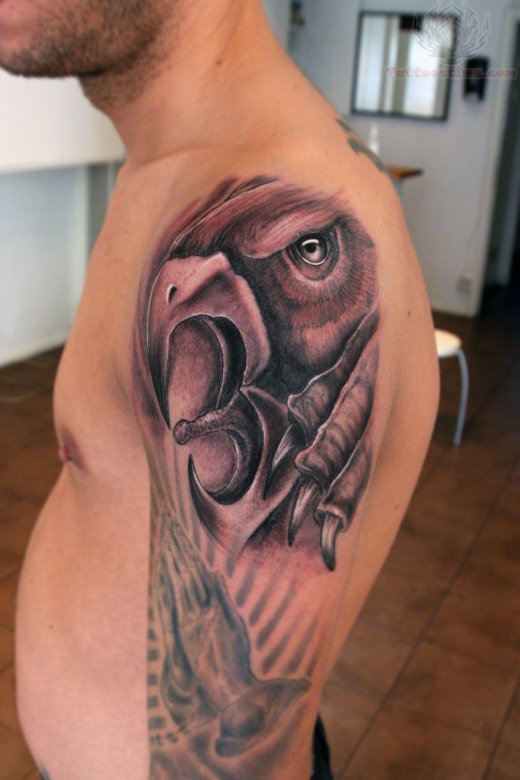 Outstanding Roaring Griffin Head Tattoo On Half Sleeve