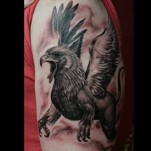 Outstanding Roaring Griffin Tattoo On Half Sleeve