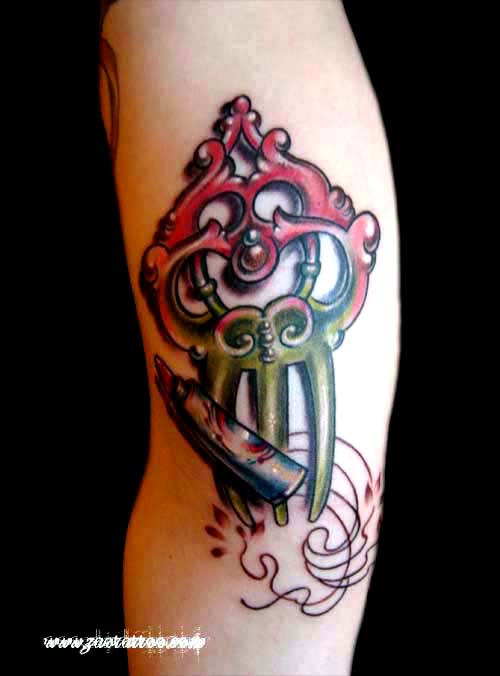 Paste Tube And Traditional Hair Comb Tattoo On Half Sleeve
