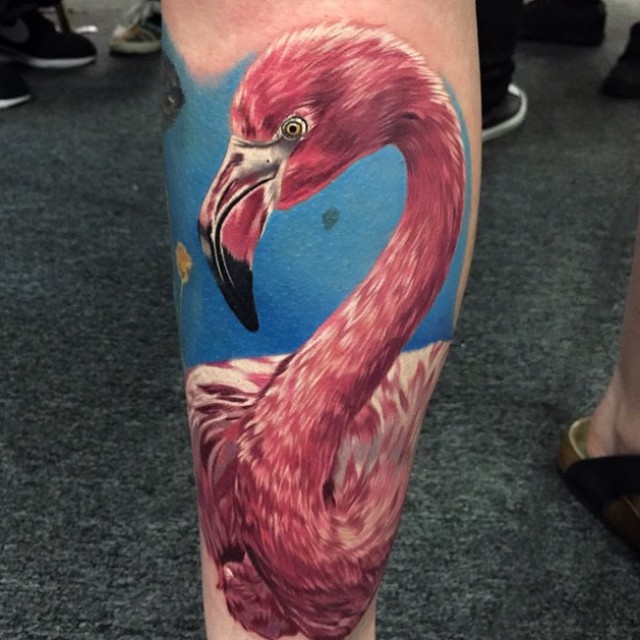 Realistic Pink Flamingo Tattoo With Blue Background Tattoo On Leg
