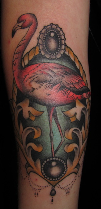 Red Flamingo In Great Frame Traditional Tattoo On Forearm