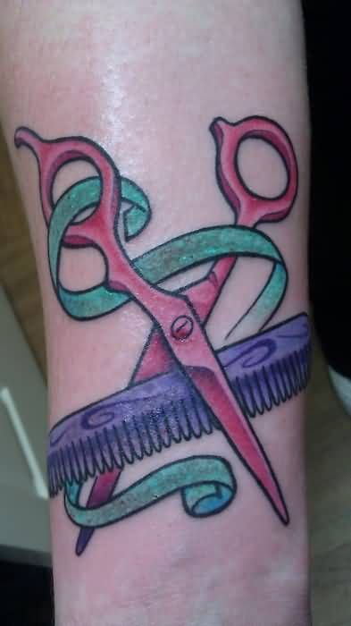 Scissor Ribbon And Comb Tattoo On Forearm